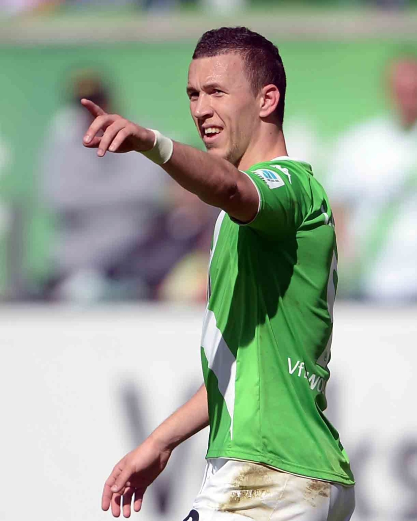 epa04729949 Wolfsburg's Ivan Perisic celebrates his 2-0 goal at the German Bundesliga soccer match between VfL Wolfsburg and Hannover 96 at the Volkswagen Arena in Wolfsburg, Germany, 02 May 2015. EPA/PETER STEFFEN (EMBARGO CONDITIONS - ATTENTION - Due to the accreditation guidelines, the DFL only permits the publication and utilisation of up to 15 pictures per match on the internet and in online media during the match)  EPA/PETER STEFFEN (EMBARGO CONDITIONS - ATTENTION - Due to the accreditation guidelines, the DFL only permits the publication and utilisation of up to 15 pictures per match on the internet and in online media during the match)