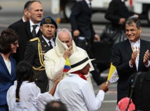 epa04832906 Pope Francis (C) walks next to Ecuador's President Rafael Correa (R) upon arrival in Quito, Ecuador, 05 July 2015. The Pope Francisco visit Ecuador, Bolivia and Paraguay from 05 to 12 July 2015  EPA/JOSE JACOME