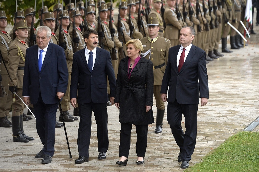 epa04968409 Hungarian President Janos Ader (2-L) receives his counterparts Milos Zeman of the Czech Republic (L), Andrej Kiska of Slovakia (R) and Kolinda Grabar-Kitarovic of Croatia (2-R) prior to the meeting of heads of state of the Visegrad Group countries in Balatonfured, 124 kms southwest of Budapest, Hungary, 08 October 2015. The discussions will focus on migration, climate change and the situation in the western Balkans. EPA/TAMAS KOVACS HUNGARY OUT